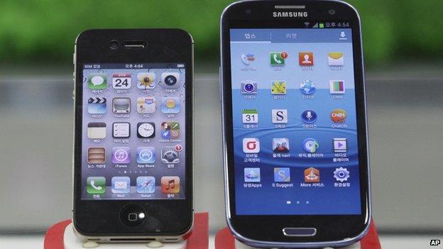 Samsung Galaxy S3, right, and Apple iPhone 4S