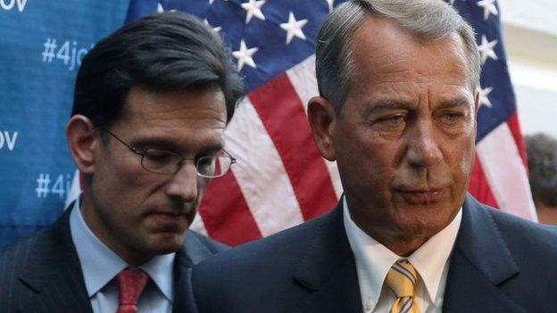 House Majority Leader Eric Cantor stands next to Speaker of the House John Boehner.