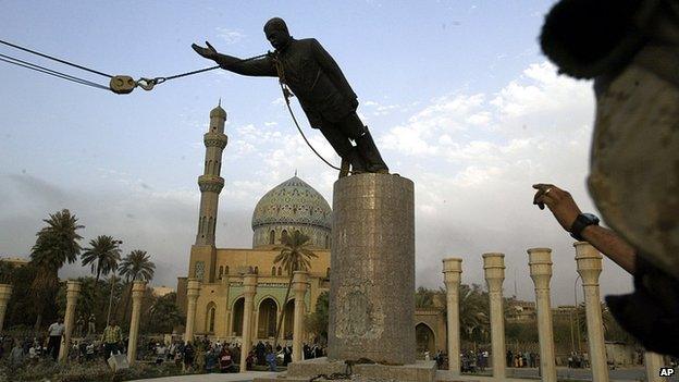 Statue of Saddam Hussein toppled in Baghdad. April 2003