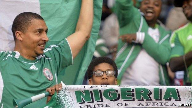 Nigeria fans cheer ahead of the international friendly soccer match between Nigeria and Scotland at Craven Cottage in London (May 2014)