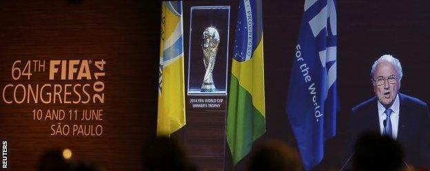 Blatter is seen on a big screen as he delivers a speech during the opening ceremony of the 64th Fifa Congress