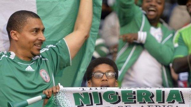 Nigeria fans cheer ahead of the international friendly soccer match between Nigeria and Scotland at Craven Cottage in London (May 2014)