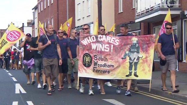 Firefighters marching to Eric Pickles' office