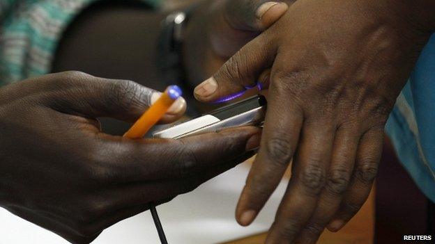 A suspected Somali illegal migrant arrested in a police swoop is processed for deportation at a holding station in Kenya's capital, Nairobi - 9 April 2014