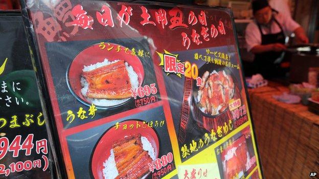 A menu of eel dish is displayed at an eel specialized restaurant in Tokyo, on Friday, 13 June, 2014