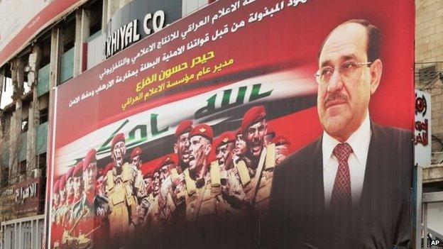 An anti-terrorism banner with a photo of Iraqi Prime Minister Nouri Maliki, in Baghdad, Iraq (18 March 2014)