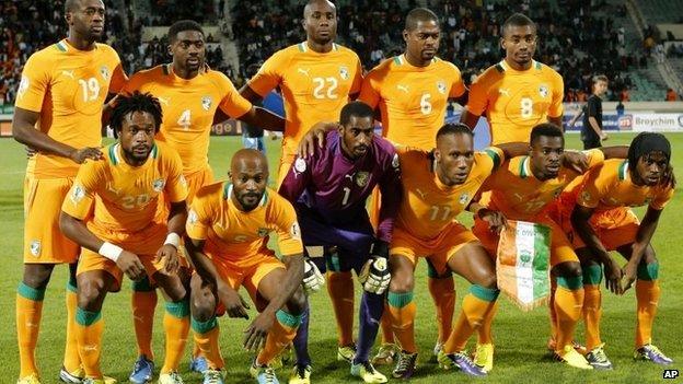 In this Nov. 16, 2013 file photo, Ivory Coast soccer team poses prior to the World Cup 2014 qualifying soccer match between Ivory Coast and Senegal at Mohammed V stadium in Casablanca, Morocco