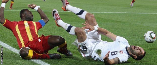 John Mensah and Clint Dempsey