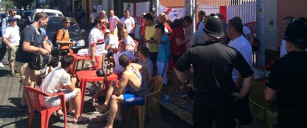 England fans gather in the centre of Manaus before the Italy game