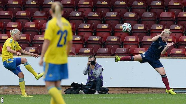 Caroline Seger curls home the opening goal for Sweden