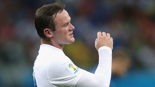 Wayne Rooney responds to a missed chance for England against Italy at the 2014 World Cup