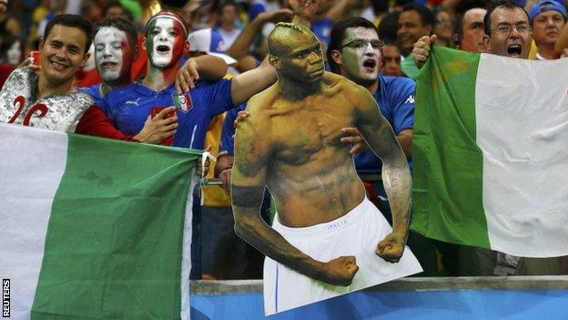 Italian fans with Mario Balotelli cut out