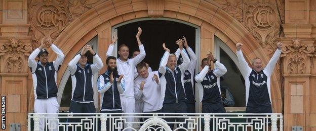 The England team applaud after Gary Ballance reaches his debut Test century against Sri Lanka