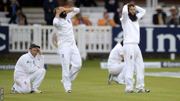 England's slips hold their hands to their heads