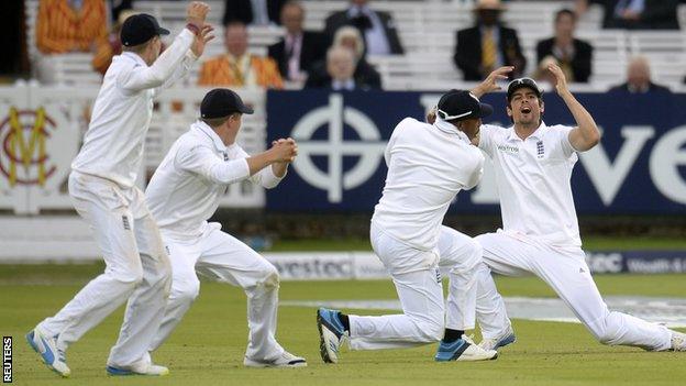 Alastair Cook and the England fielders react after an edge off the final ball falls just short of second slip