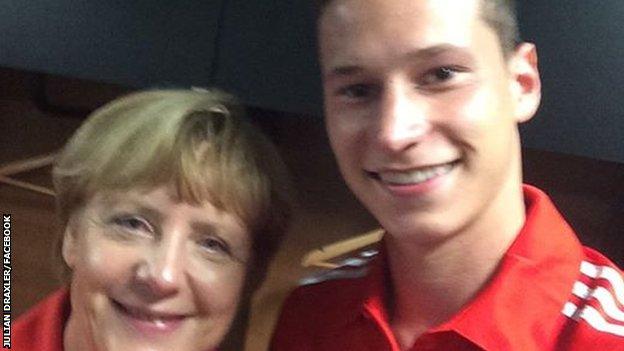 Germany Chancellor Angela Merkel and Germany player Julian Draxler