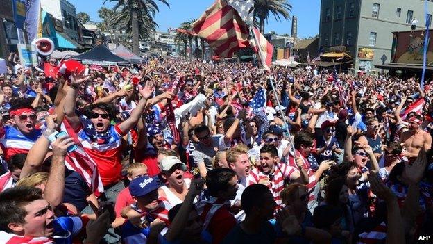 US soccer fans watching from the pier at Hermosa Beach, California 16 June 2014