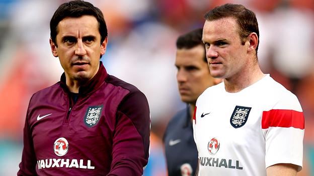 England coach Gary Neville with forward Wayne Rooney