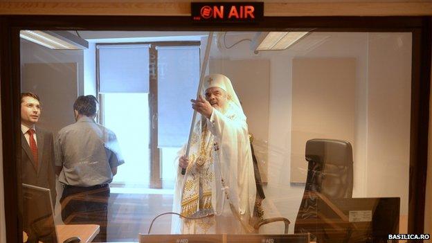 The patriarch anoints a radio studio