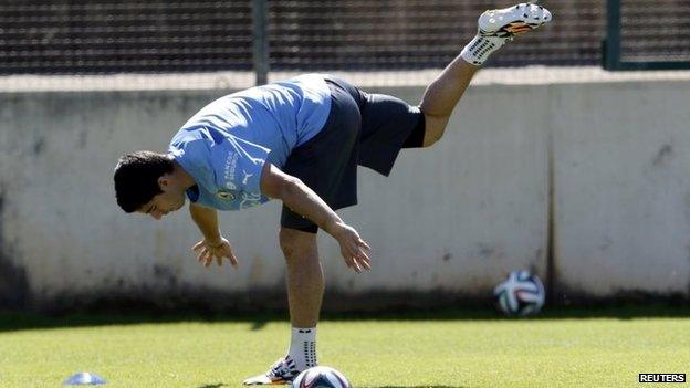 Uruguay's Luis Suarez exercises during a training session at Jacare stadium in Sete Lagoas, near Belo Horizonte, on 15 June, 2014