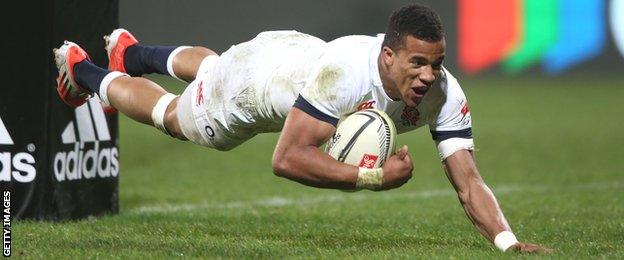 Anthony Watson dives over to score for England