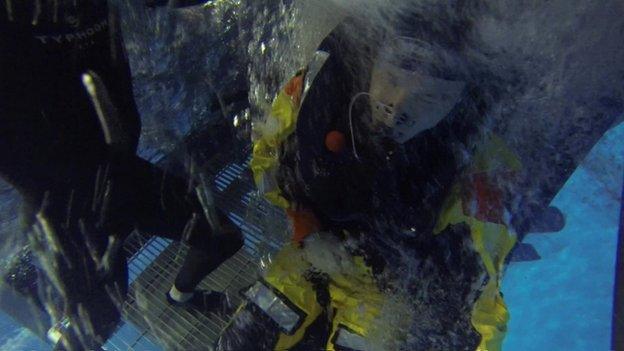 BBC correspondent Richard Westcott in an underwater safety training exercise