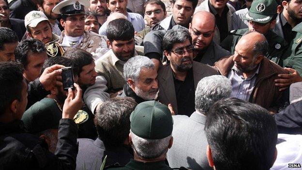 Qasem Soleimani attends the funeral of an Iranian soldier killed in Syria