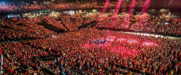 Belgium supporters watch on a big screen in the Antwerp Sportpaleis in Antwerp