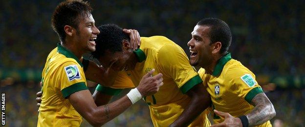 Brazilian striker Jo (centre) celebrates scoring against Mexico in the 2013 Confederations Cup