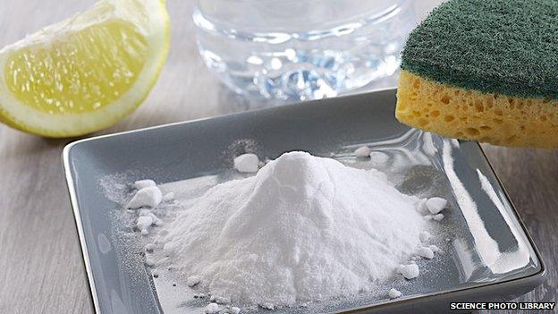 tray of baking soda and a wedge of lemon