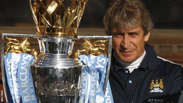 Manchester City boss Manuel Pellegrini with the Premier League trophy