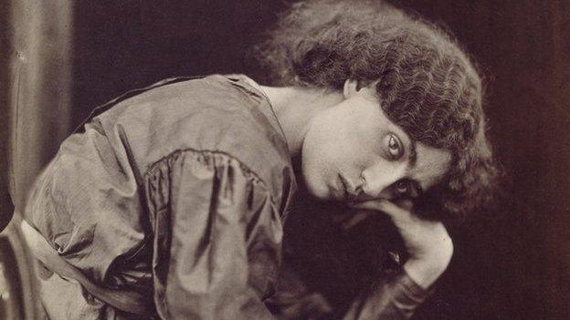 Jane Morris seated on a divan