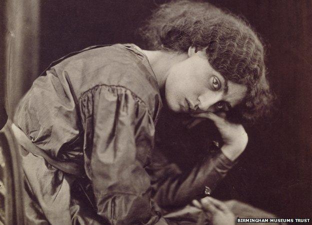 Jane Morris seated on a divan