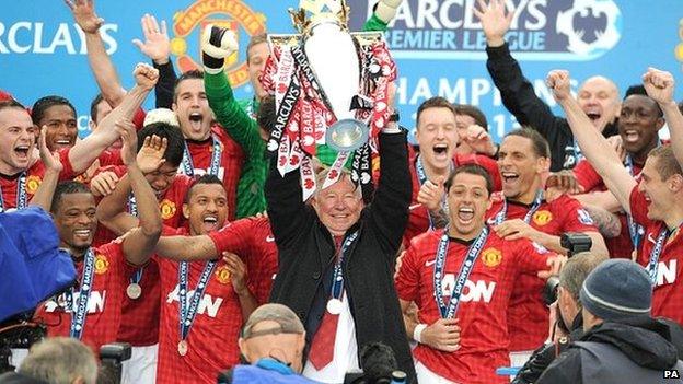 Sir Alex Ferguson lifts the Premier League trophy