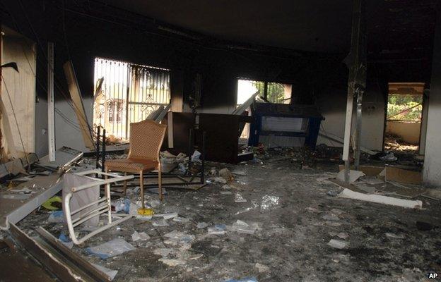 The file photo shows glass, debris and overturned furniture are strewn inside a room in the gutted US consulate in Benghazi, Libya, after an attack that killed four Americans, including Ambassador Chris Stevens