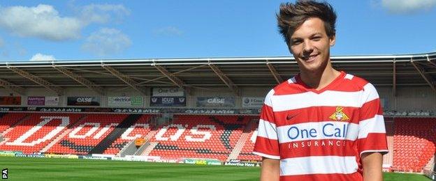 One Direction's Louis Tomlinson Doncaster Rovers