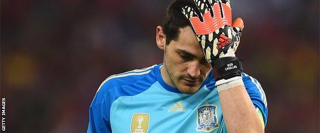 A dejected Iker Casillas after Spain are knocked out of the World Cup in Brazil