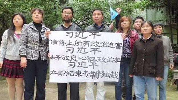 The activists with their banner