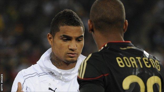 Ghana's striker Kevin-Prince Boateng (L) shakes hands with Germany's defender Jerome Boateng