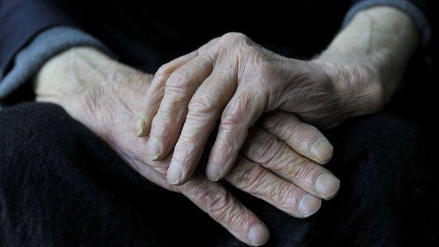 Hands of elderly person