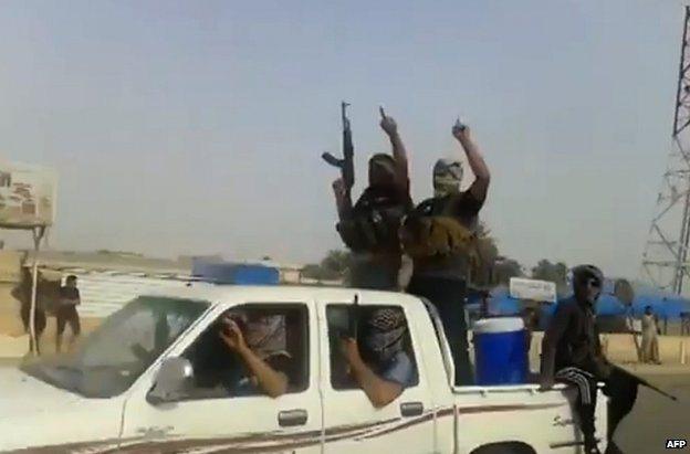 Alleged ISIS militants in the town of Baiji