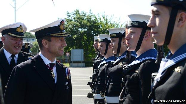 Commanding Officer, Cdr Hywel Griffiths and Rear Admiral Matthew Parr inspect the crew