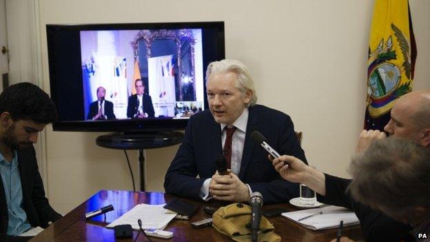 Julian Assange speaking to the media at the Ecuadorean embassy in London. 19/06/2014