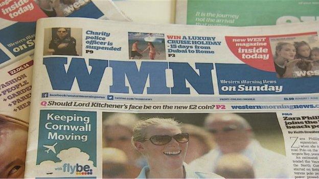 A dummy edition of Sunday's newspaper