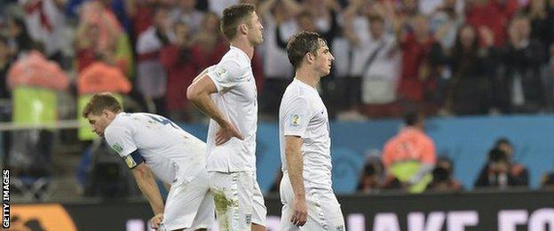 Steven Gerrard, Gary Cahill and Leighton Baines look distraught