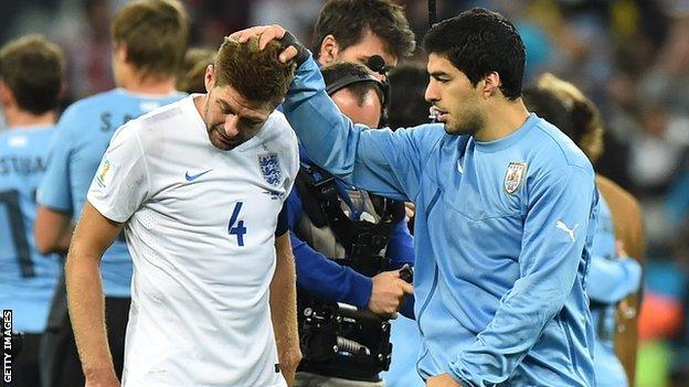 Suarez consoles a distraught Gerrard.