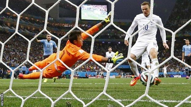 Wayne Rooney scores for England against Uruguay