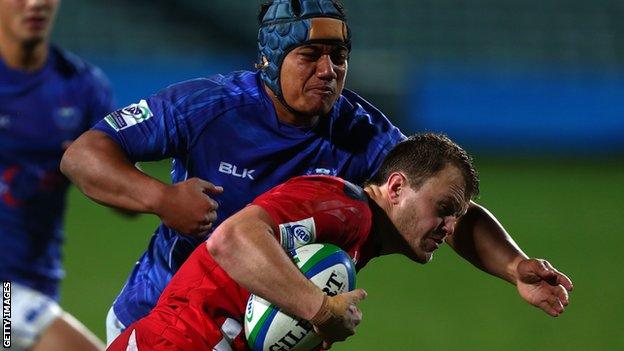 Samoa's Nathaniel Apa and Wales' Steffan Hughes