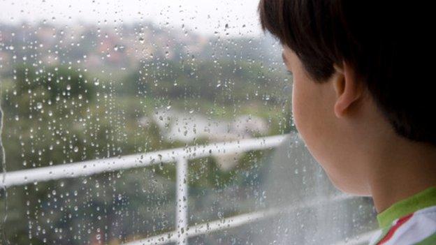 Boy at a window