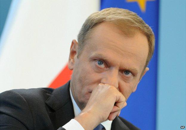 Prime Minister Donald Tusk listens to a question during a press conference in Warsaw - 19 June 2014